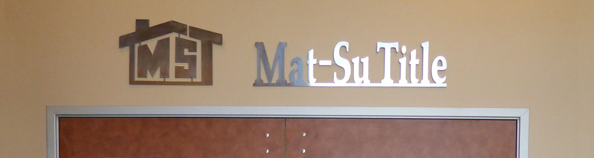 Mat Su sign over door